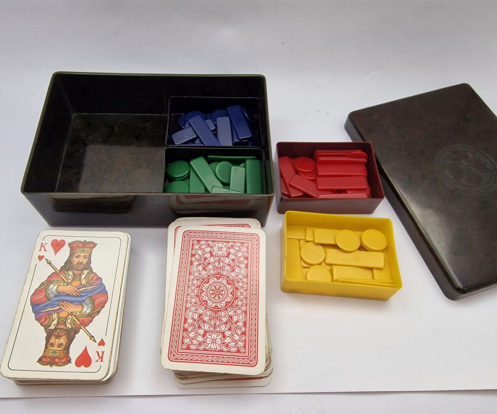 Playing cards and chips in a Bakelite case