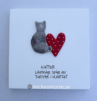 Katter lämnar spår av tassar i hjärtat