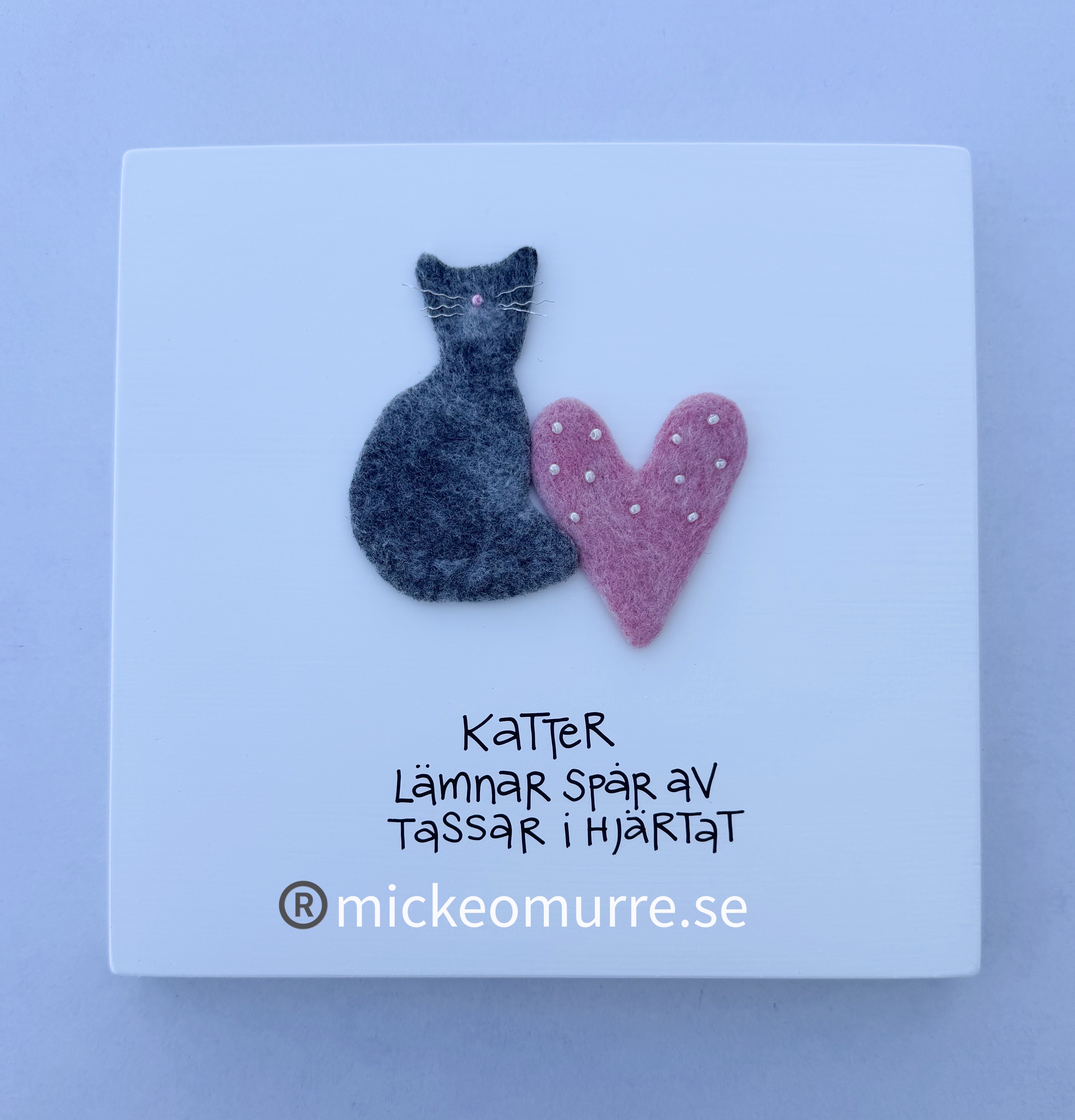 Katter lämnar spår av tassar i hjärtat