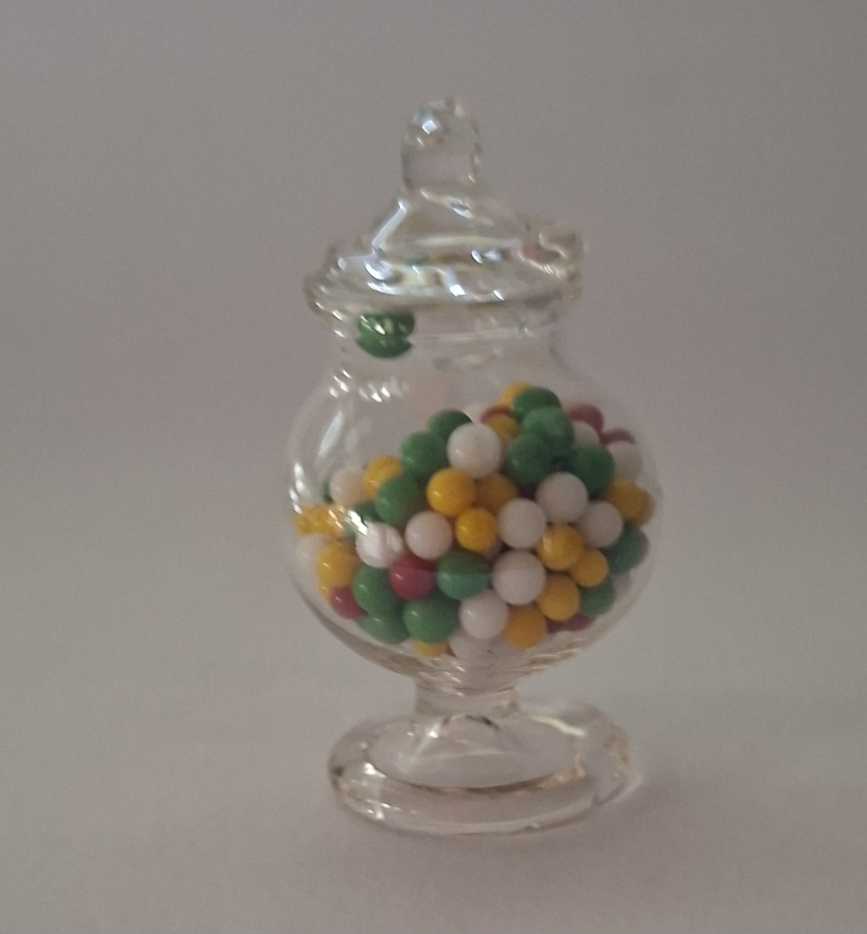 Glass jar with candy balls