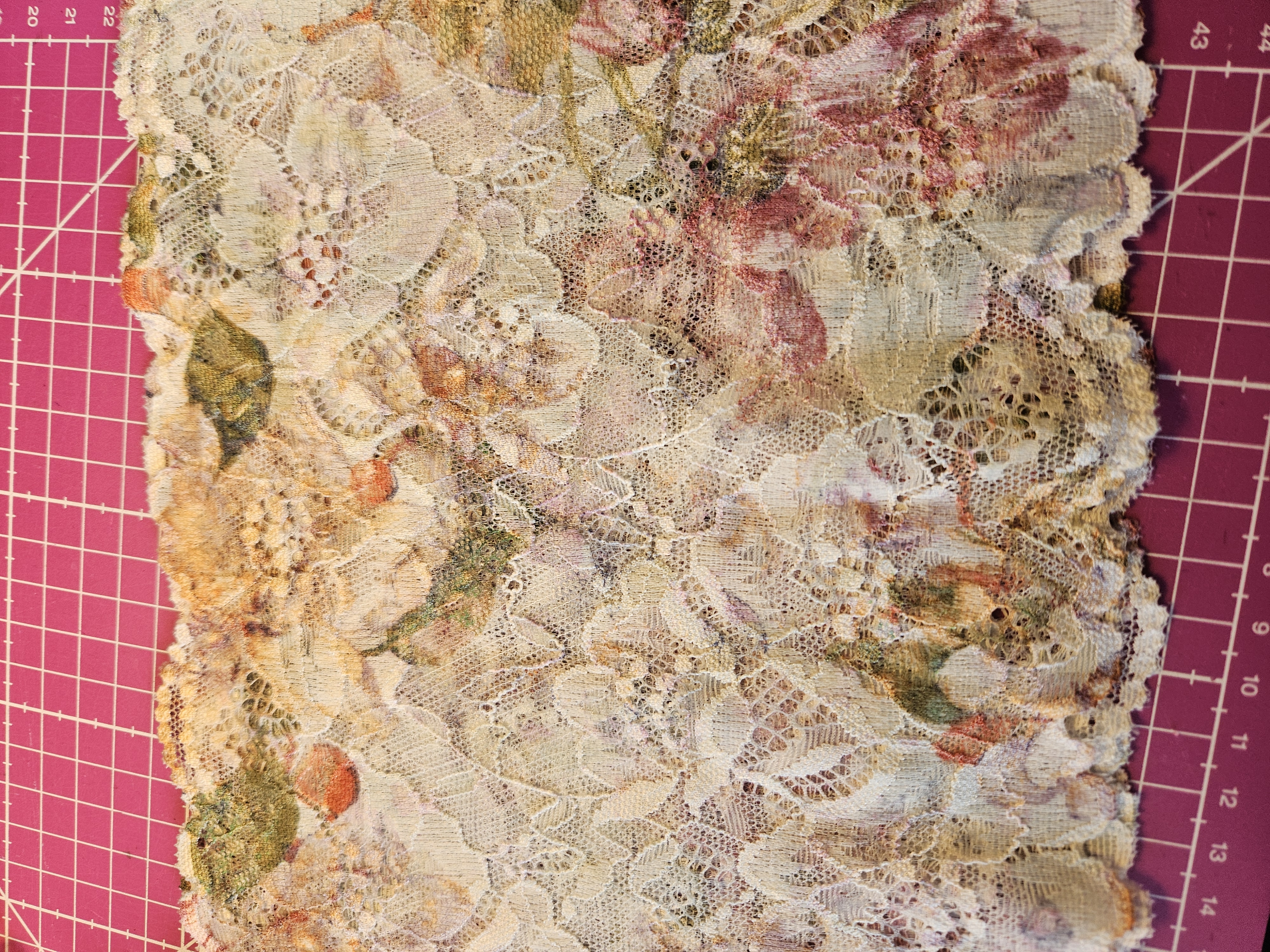 Off-white stretch lace with multicolored flowers