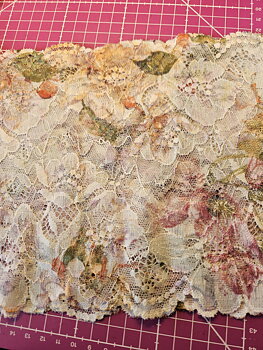 Off-white stretch lace with multicolored flowers