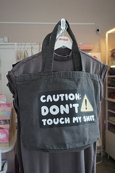 Black tote bag CAUTION