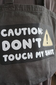 Black tote bag CAUTION