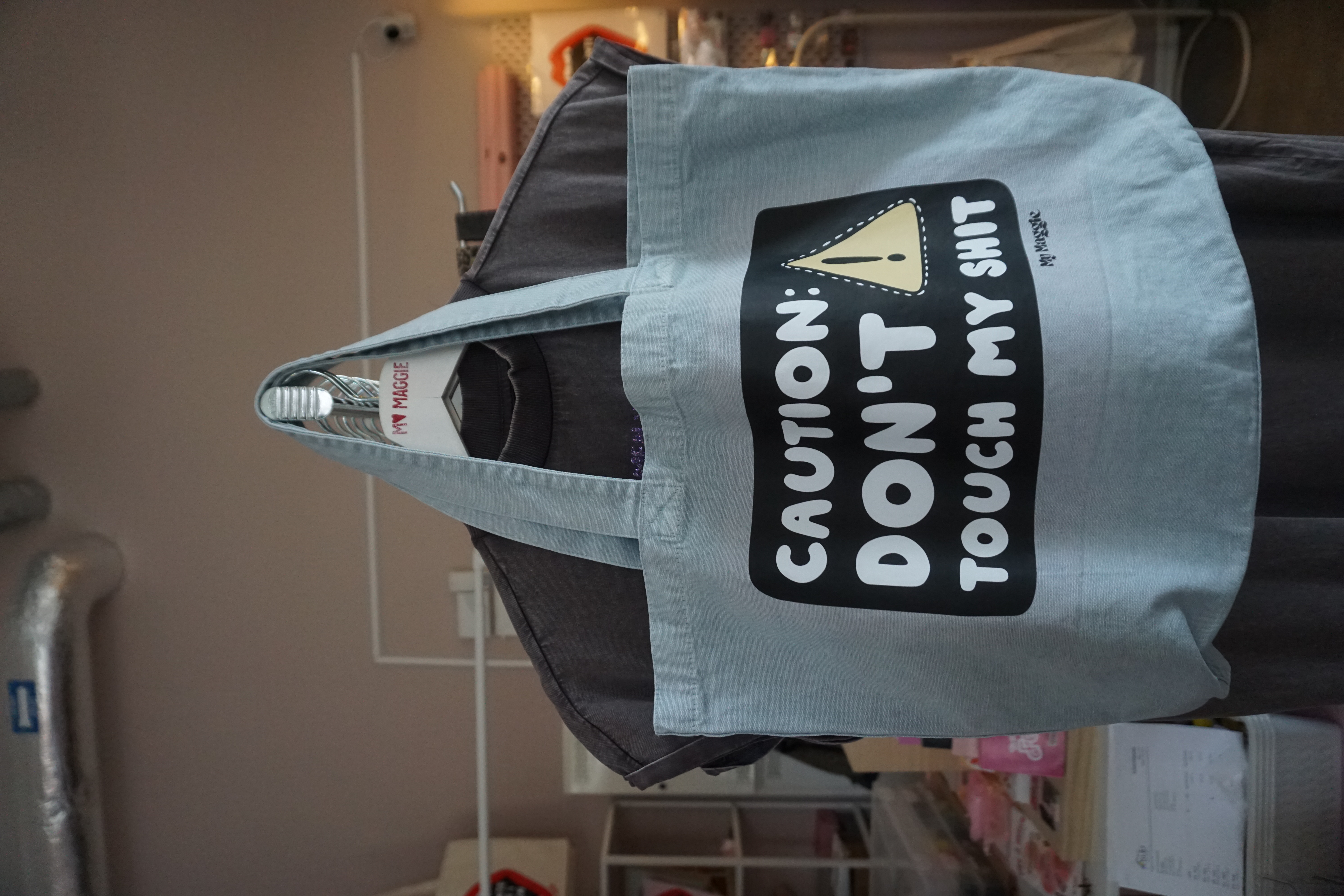 Light blue tote bag CAUTION