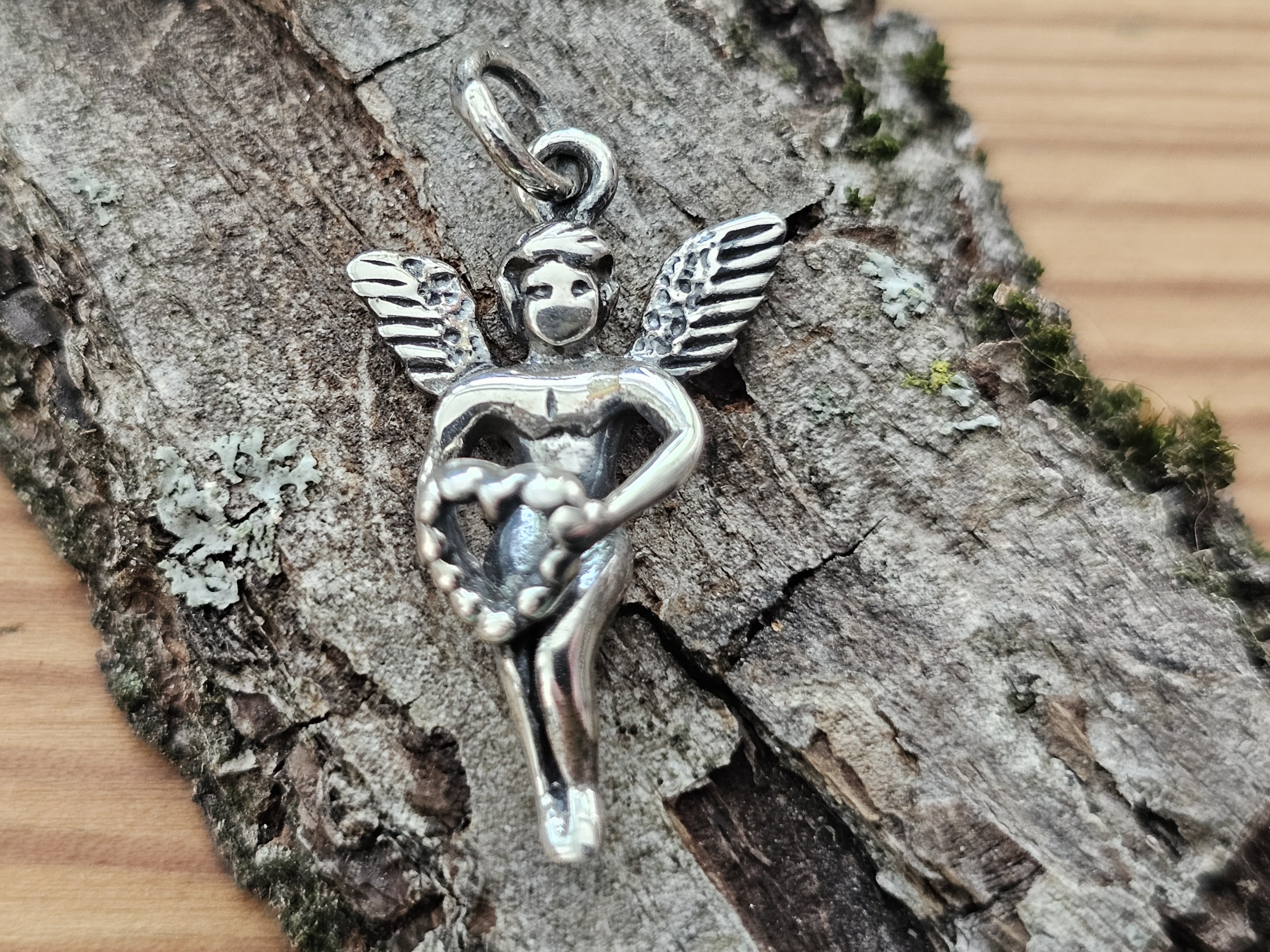 Amor, hänge ca. 27mm inkl lödd ögla, 925-silver