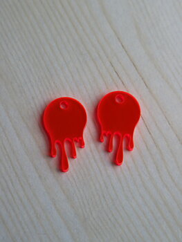 Melted neonröd hängen