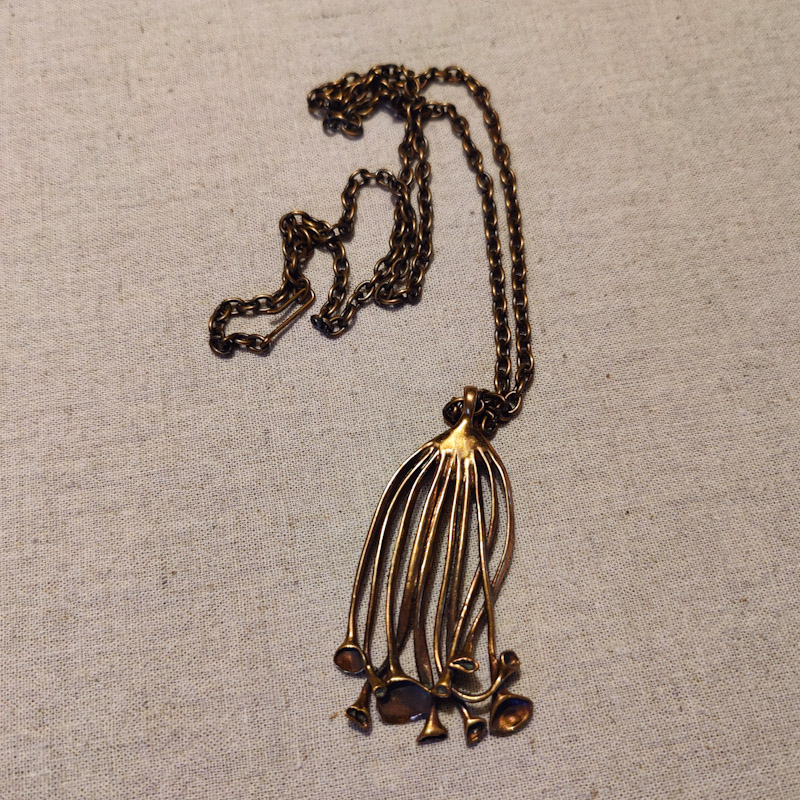 Lava halsband i brons