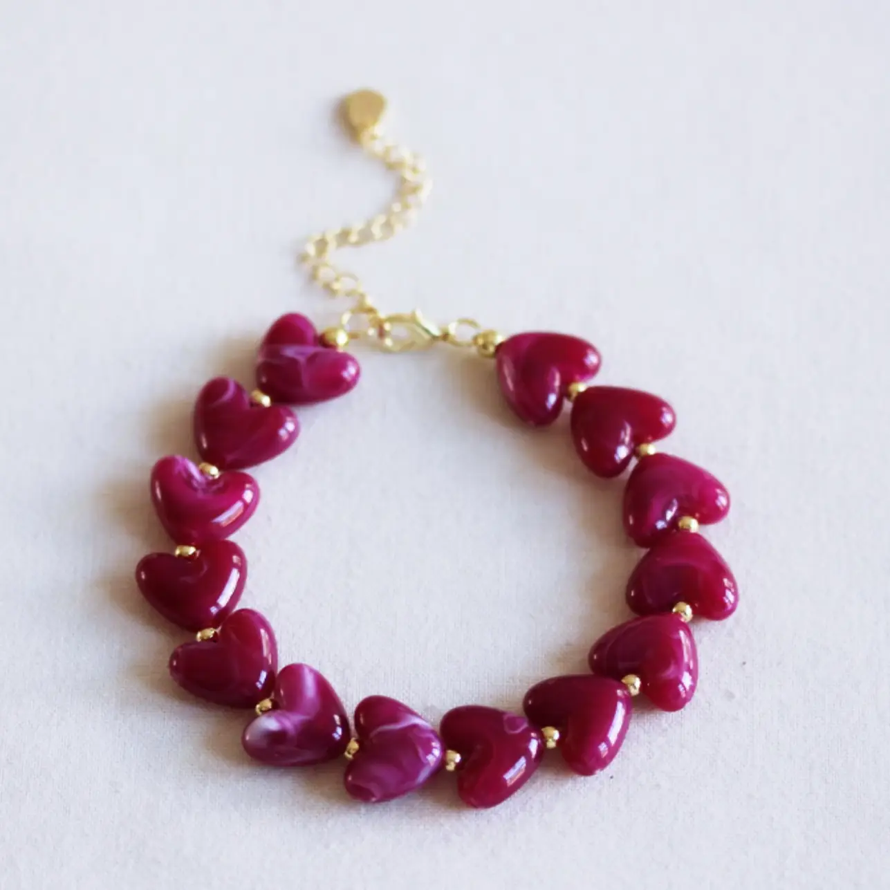 Armband magenta hjärtan