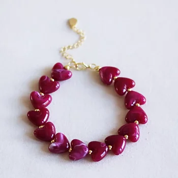 Armband magenta hjärtan
