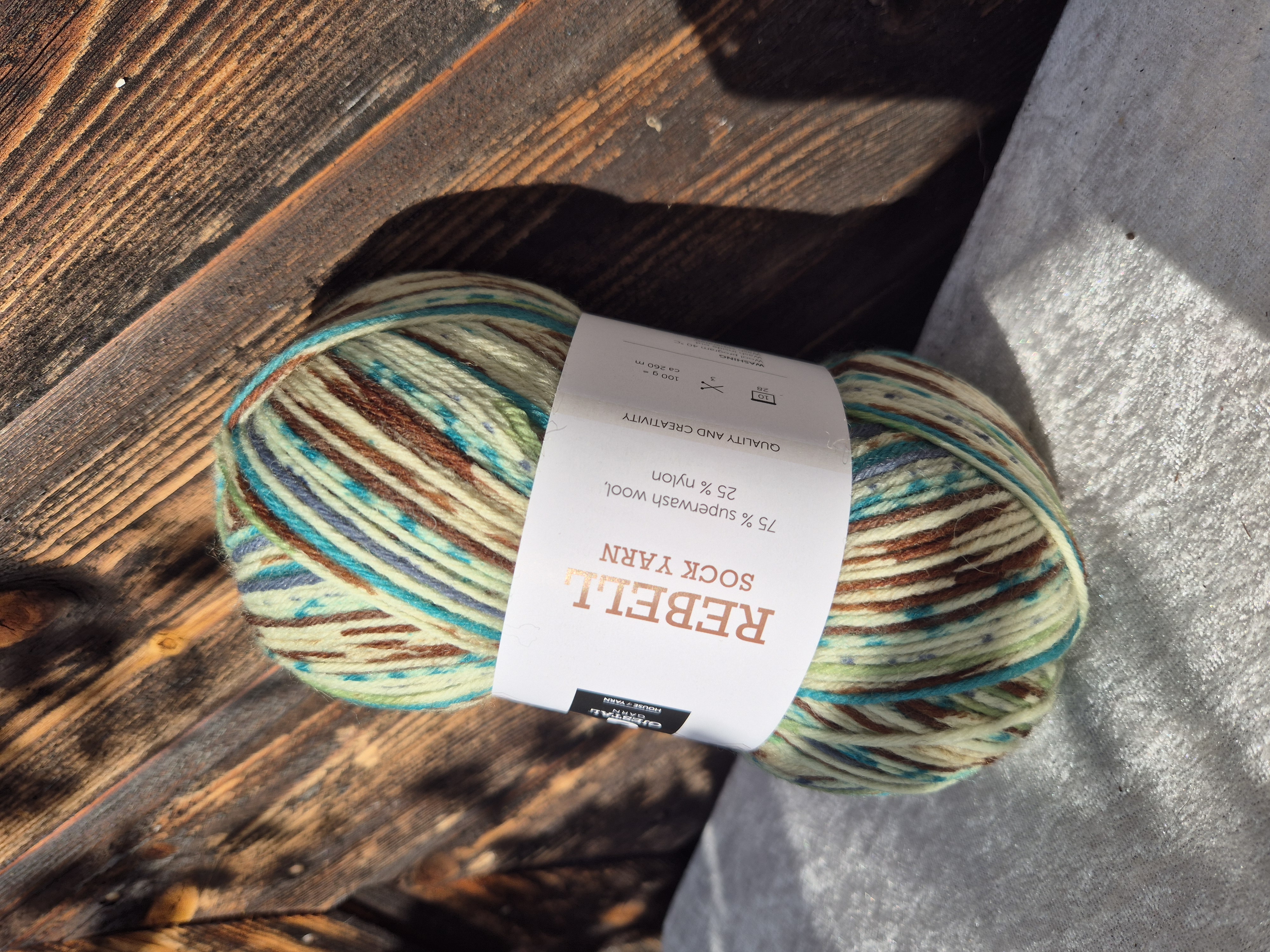 Rebell sockgarn 9408 Brun/grön print 100gr Gjestal garn