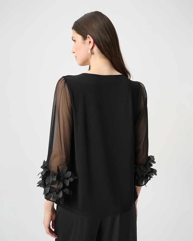 Blus vid meshärm med blommor svart