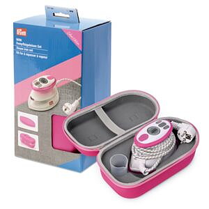 Rosa mini-ångstrykjärn med silikonplatta och förvaringsfodral som helt set