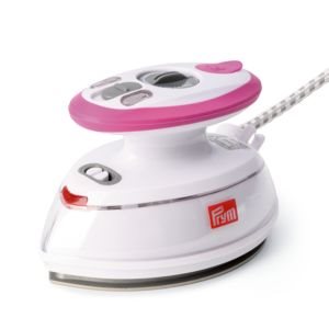 Rosa mini-ångstrykjärn med silikonplatta och förvaringsfodral som helt set - 2