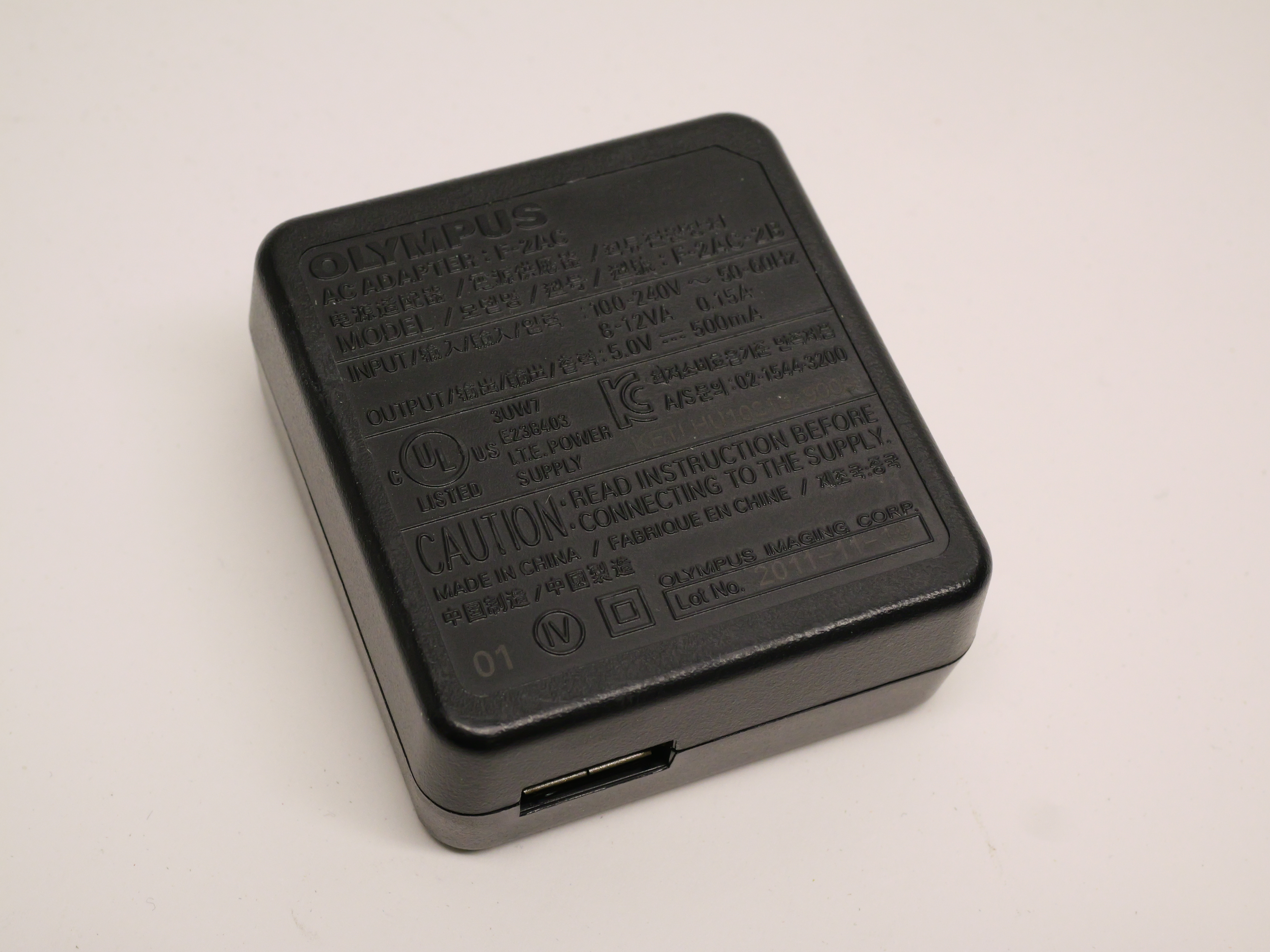 Beg  Olympus F-2AC Nätadapter för laddning av batteri i kameran