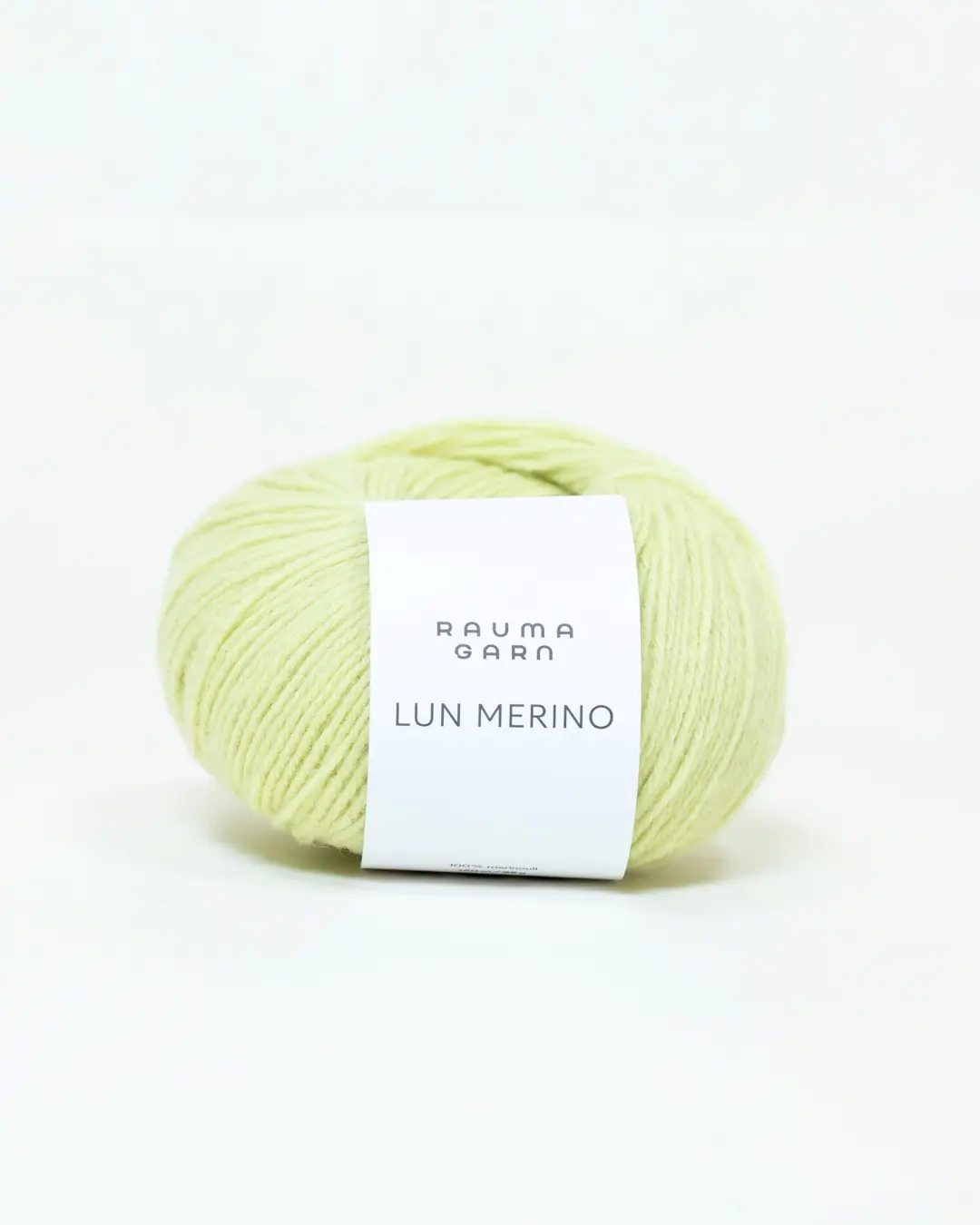 Nystan Pistagekräm Lun Merino Rauma 85 i ljus gulgrön nyans.
