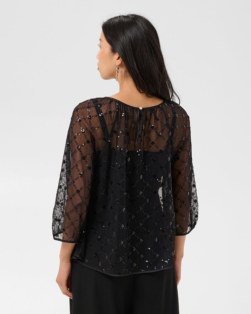 Blus Dimka transparent glitter svart
