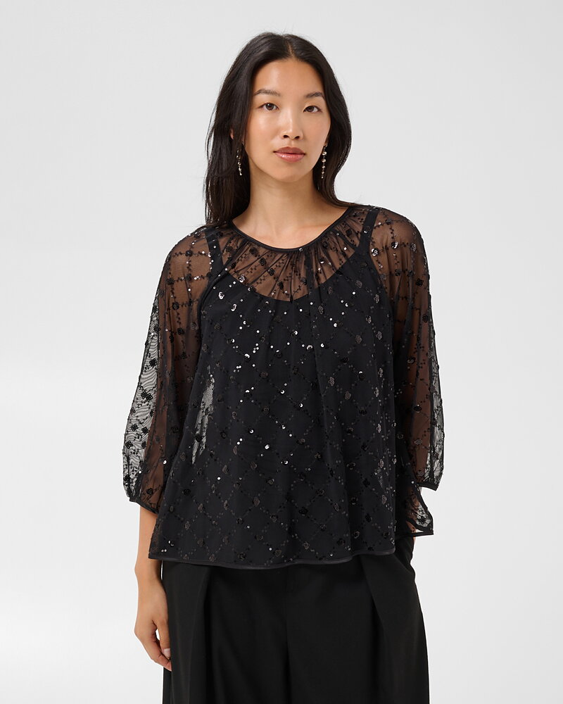 Blus Dimka transparent glitter svart