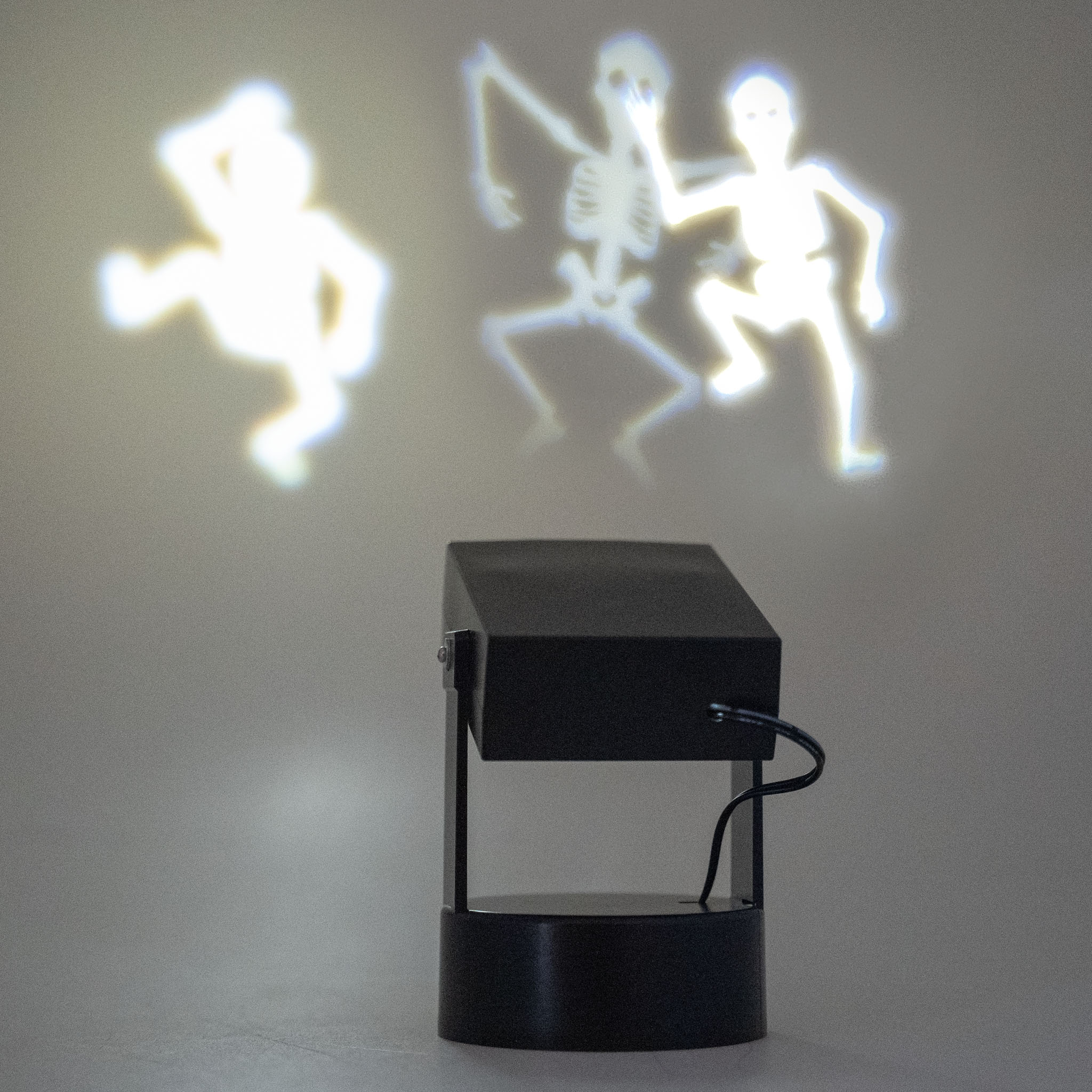 Projector with a Dancing Skeleton