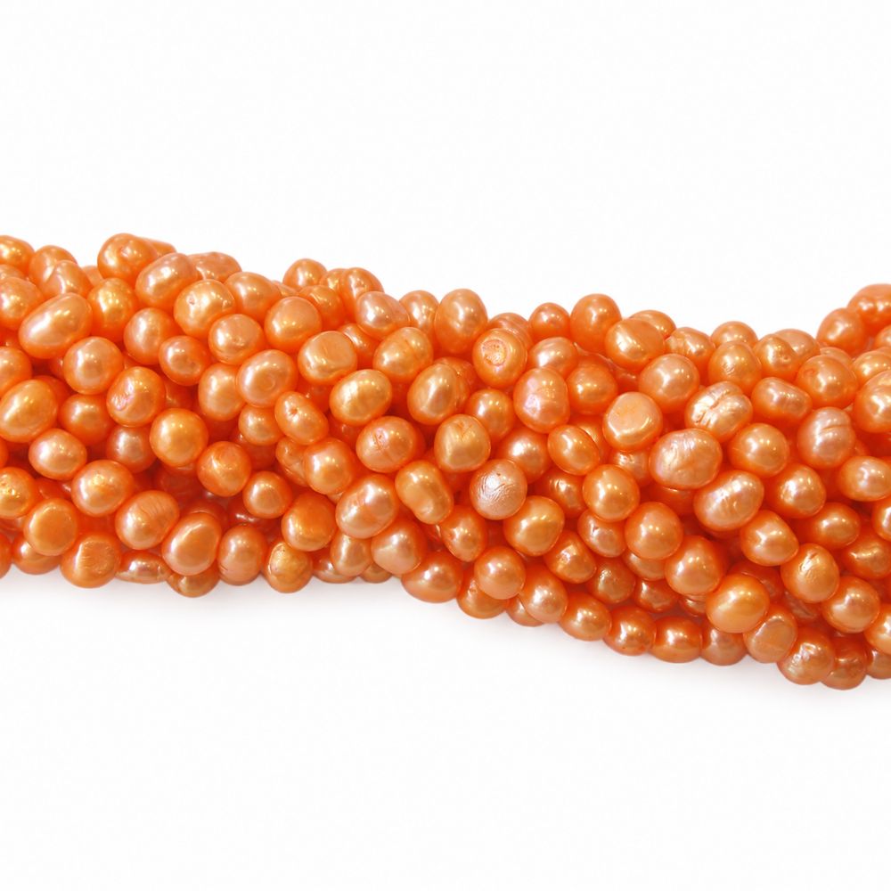 Sötvattenspärlor orange nuggets 5–6 mm