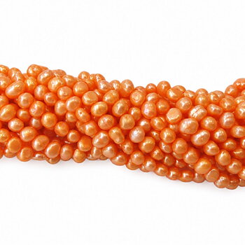 Sötvattenspärlor orange nuggets 5–6 mm