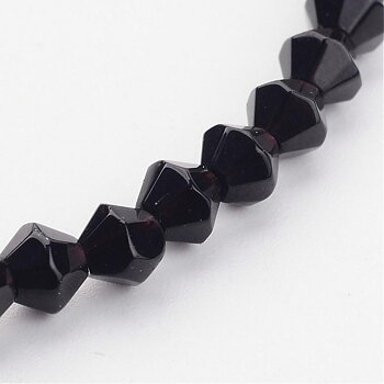 Glaspärlor bicone svart 4mm ca 80st