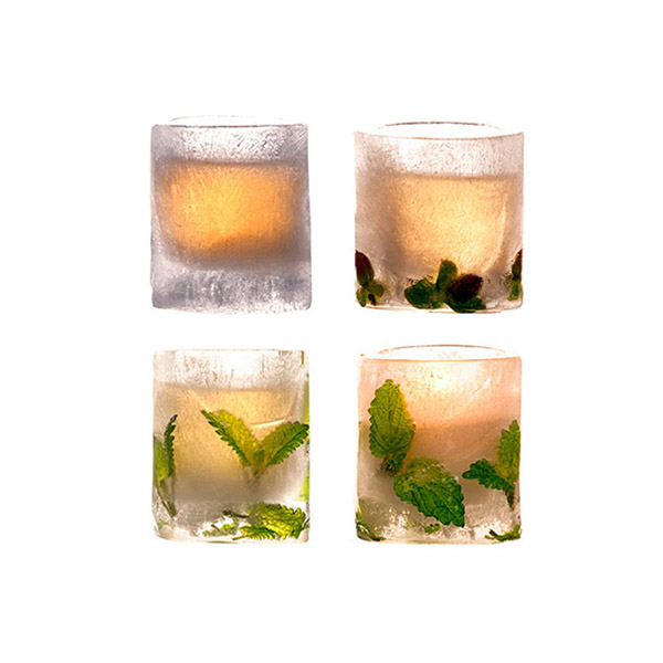 Garnerade shotglas av is
