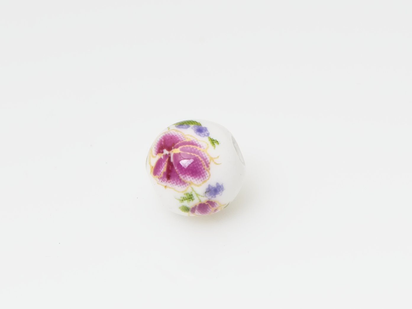 Porslinspärlor med blommor