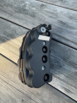 FRONT CALIPER ASSEMBLY