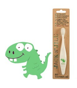 Hammasharja vihreällä dinosauruksella