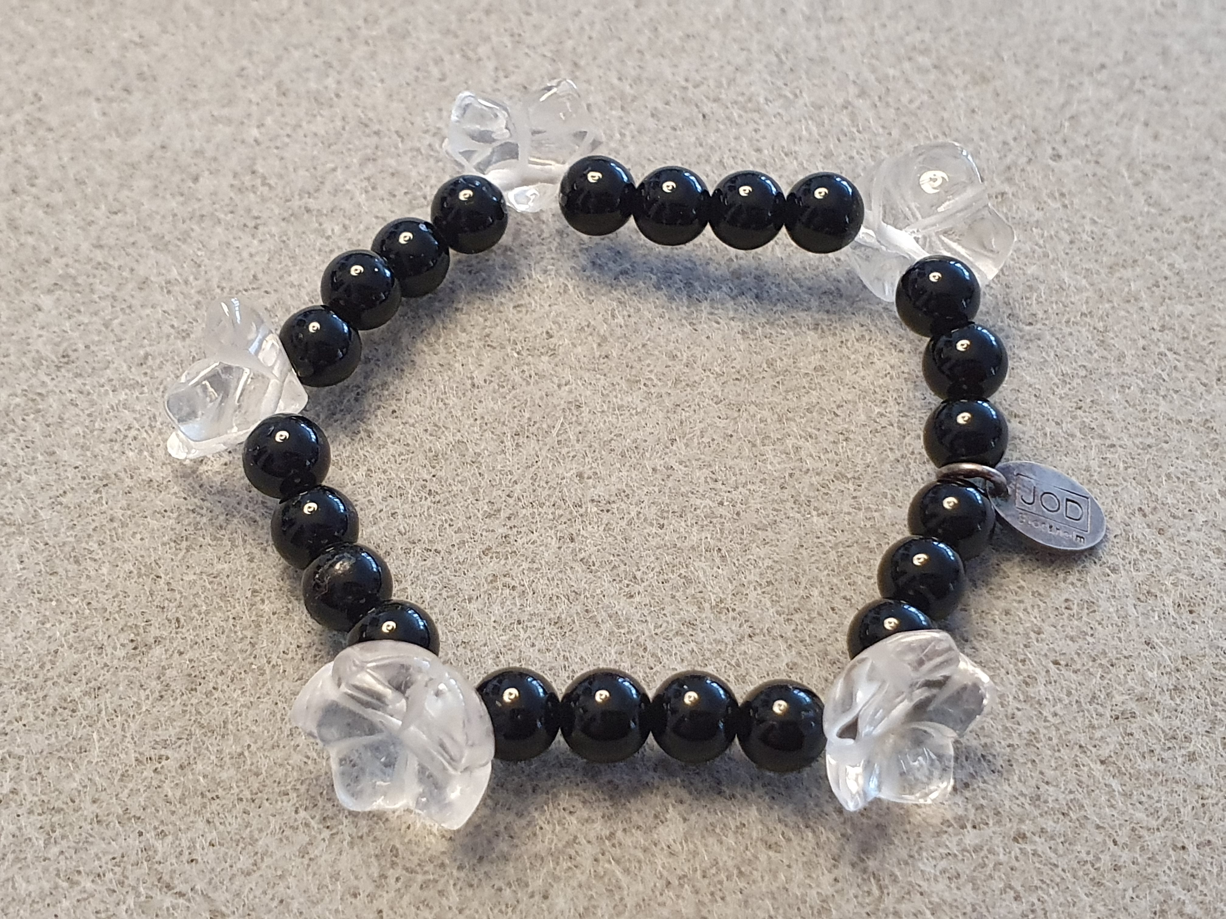 JOD Flower: Svart onyx kula ca. 6mm +bergkristall blommor, armband, innermått ca. 15cm, JOD-tag 925-silver