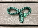 Rope connector with decorative end knot for neck ropes