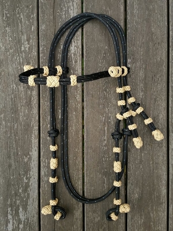 Rope bridle with knot adjustment and decorative knots