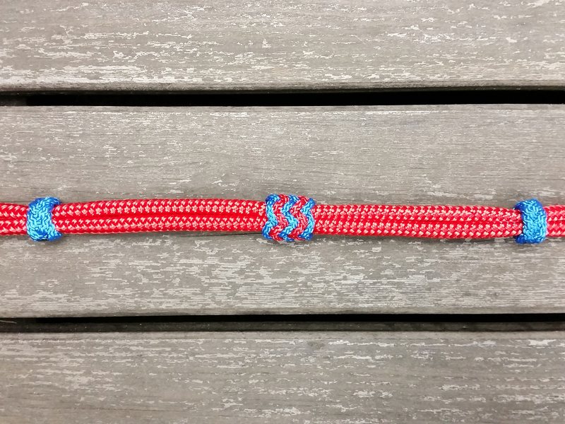 Neck rope with knot adjustment and decorative knots - 3