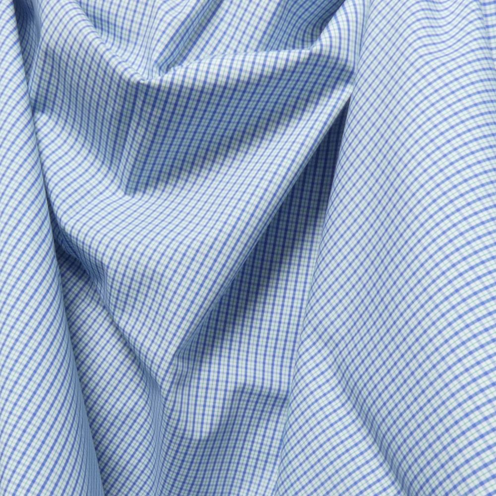 Bundle of 2,5 meters  - Blue-green checked cotton fabric on off-white base - 2