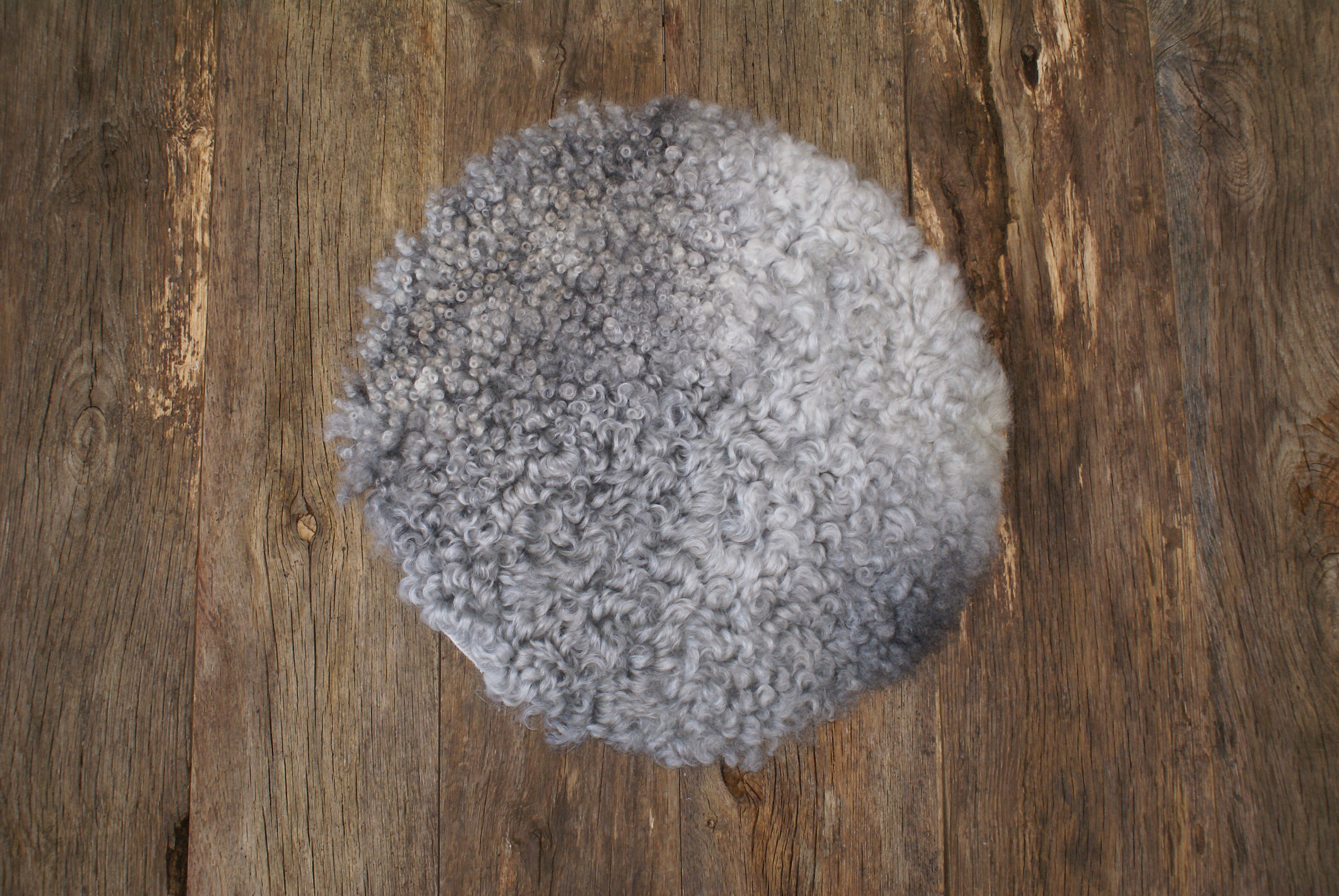 Gray sheepskin seat cover