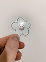 Smileyblomma klistermärke