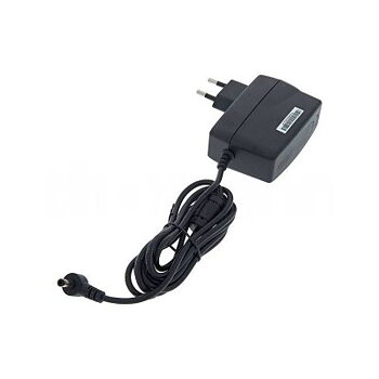 Casio AD-E95100LG AC adapter. 9.5V 1A