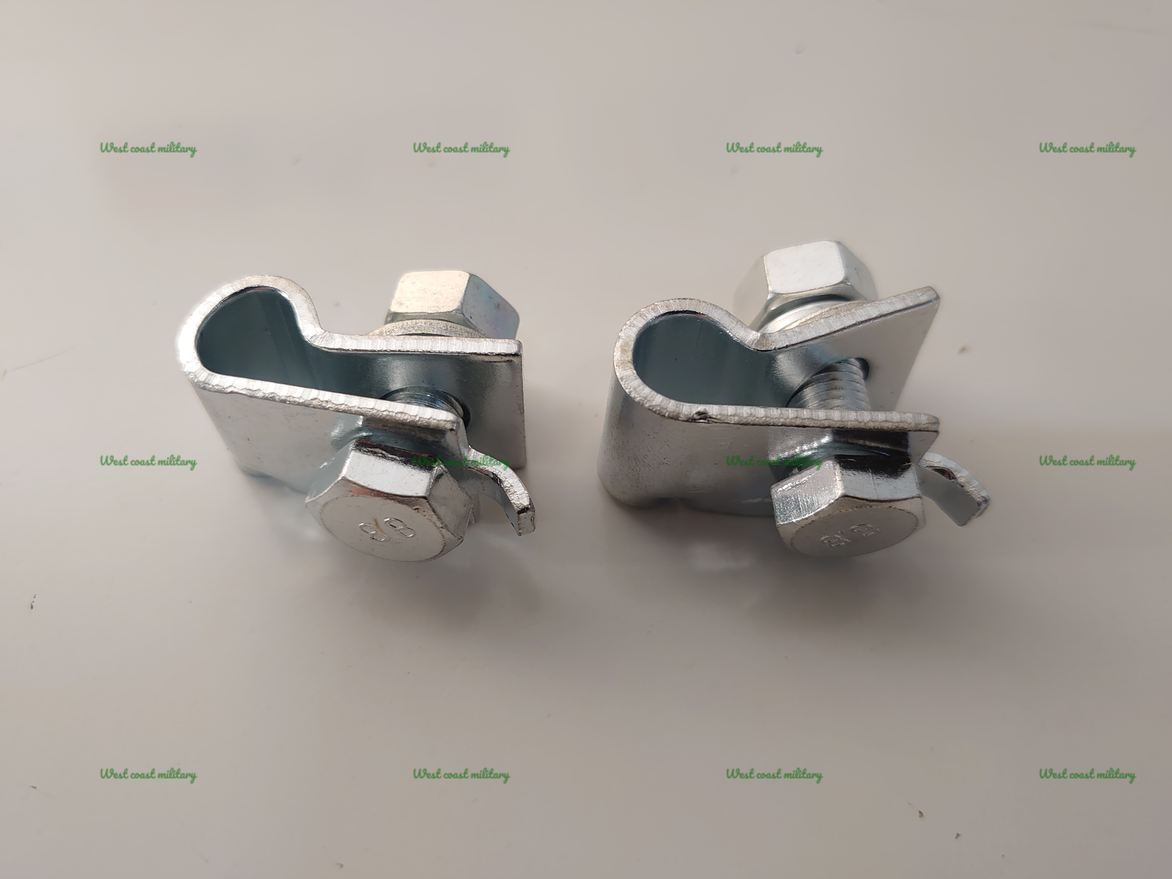 E brake cable clamp. Pair