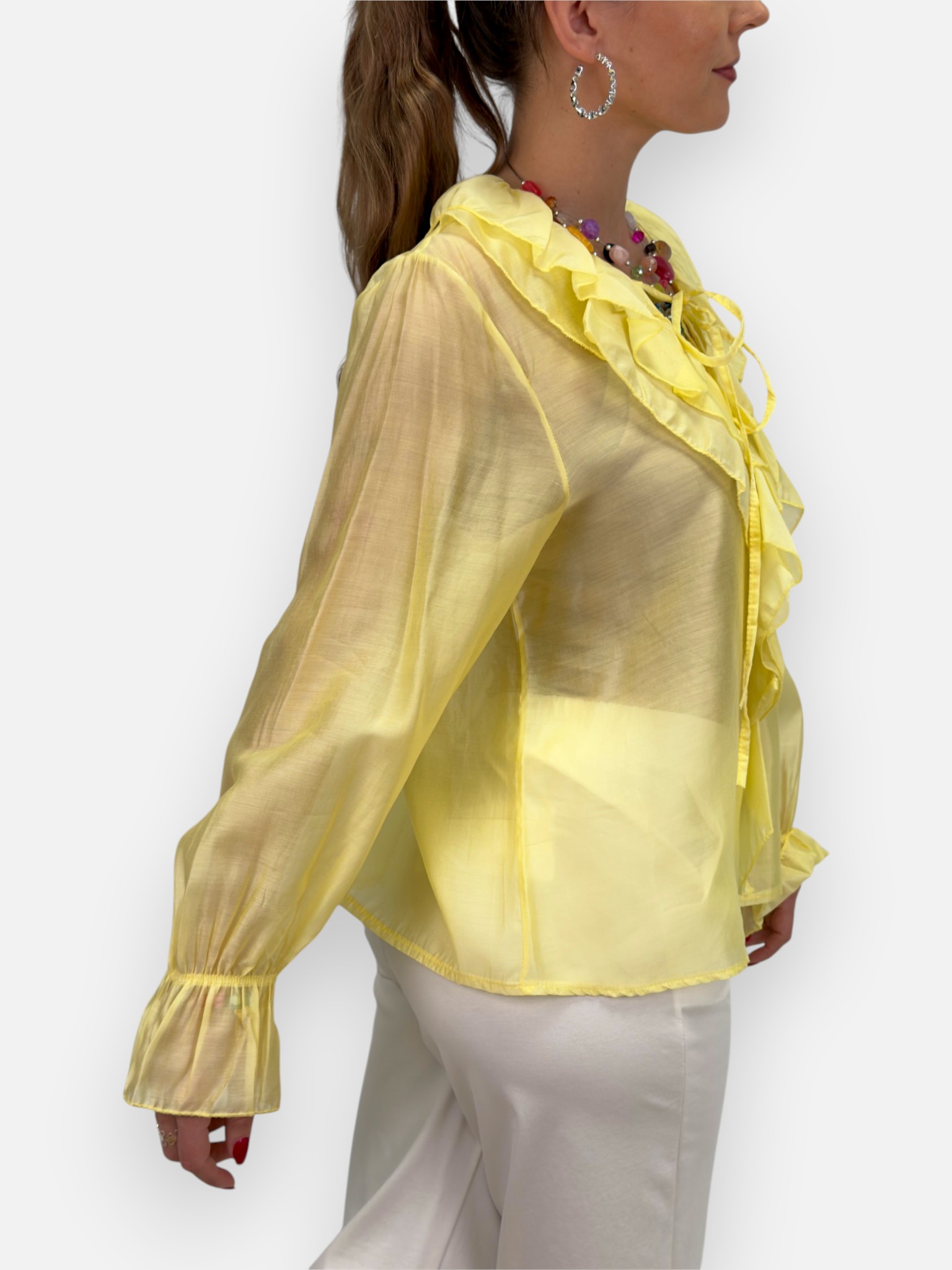 Blus med volanger
