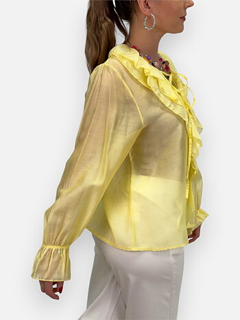 Blus med volanger