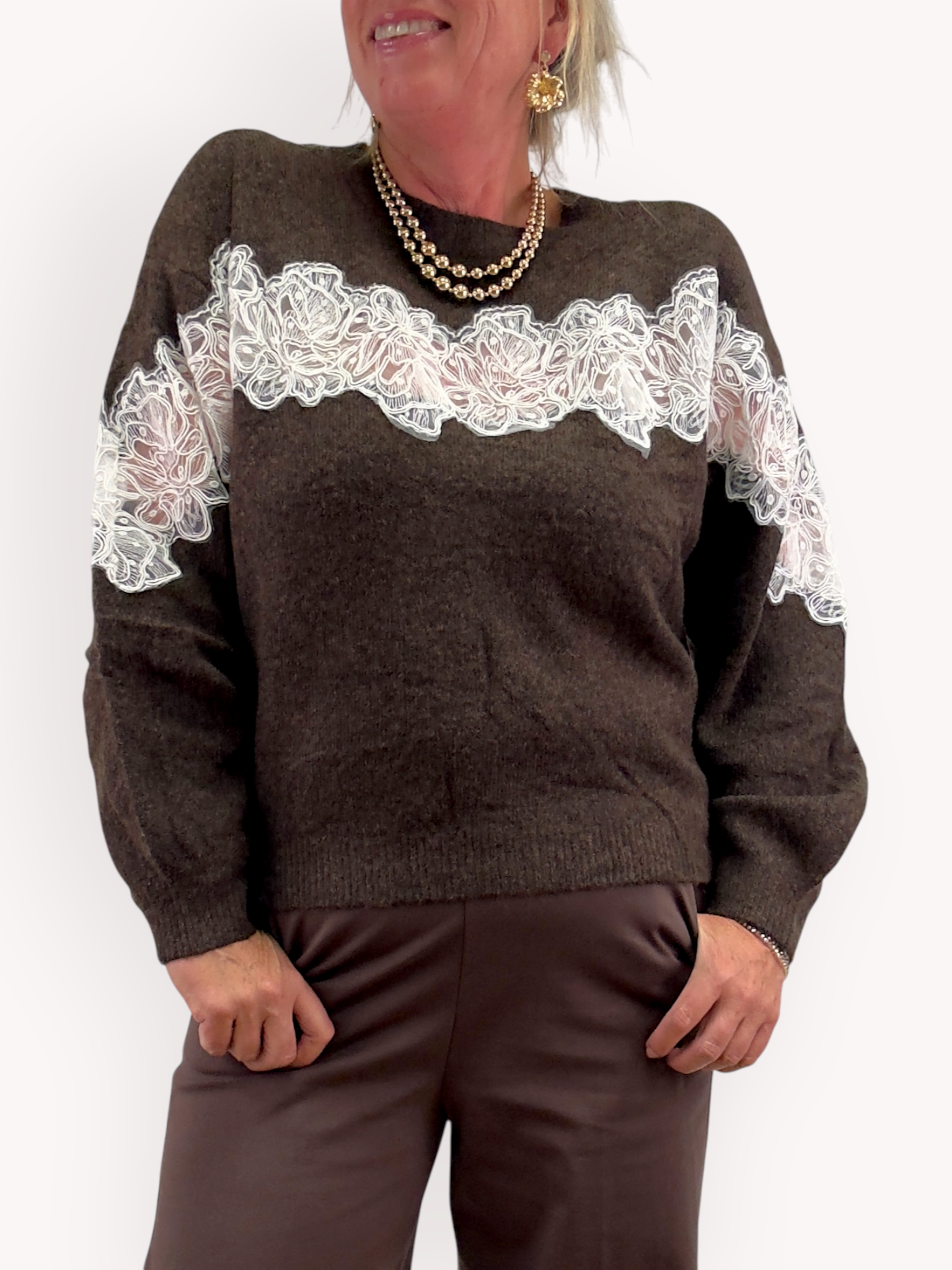 Knitted sweater with lace