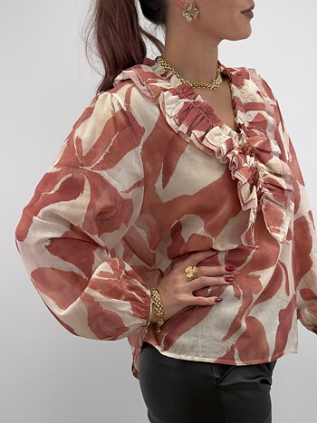 Blus med volangdetaljer