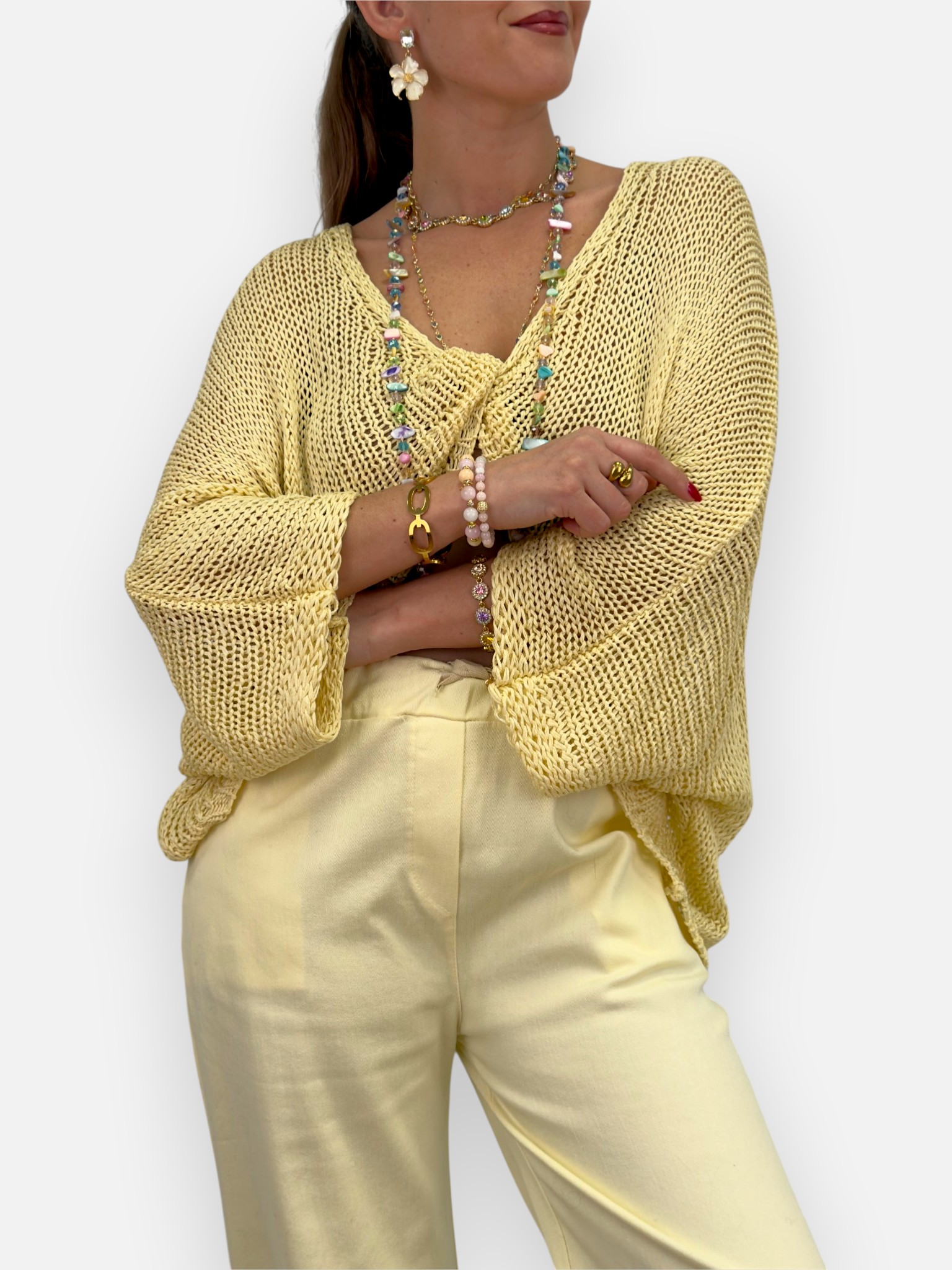 Open-knit sweater with knot