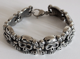 Scull and bones armband. - 2