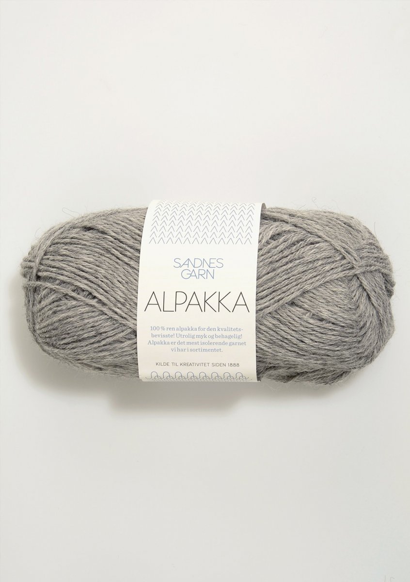 1042 Grå, Alpakka