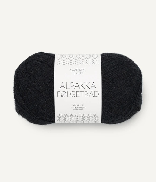 1099 Svart, Alpakka Följetråd