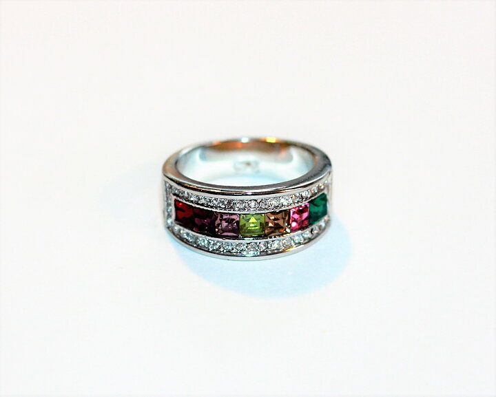 Silverfylld ring med multistenar
