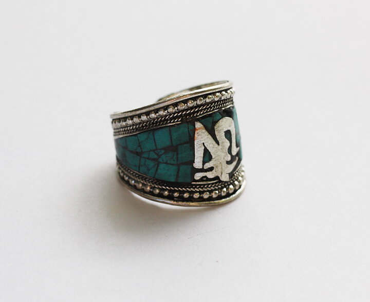 Ring med aum tecken 
