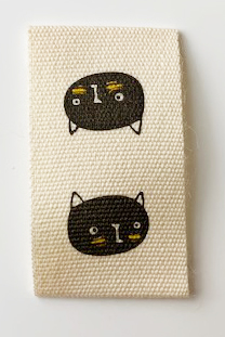 Tryckt bomulls lapp Katt (svart)